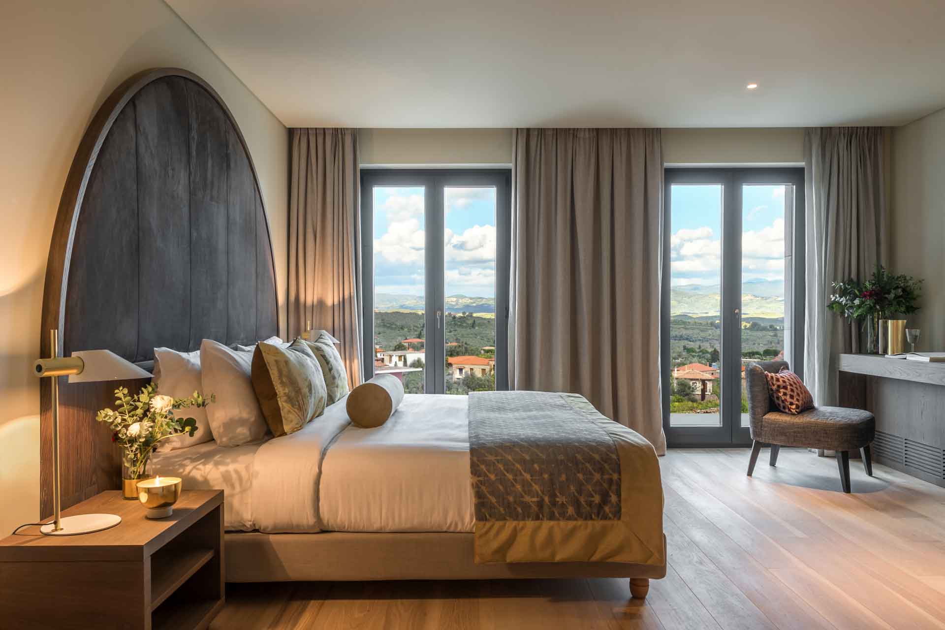 Bedroom at Euphoria Retreat with a view of the Spartan mountains.