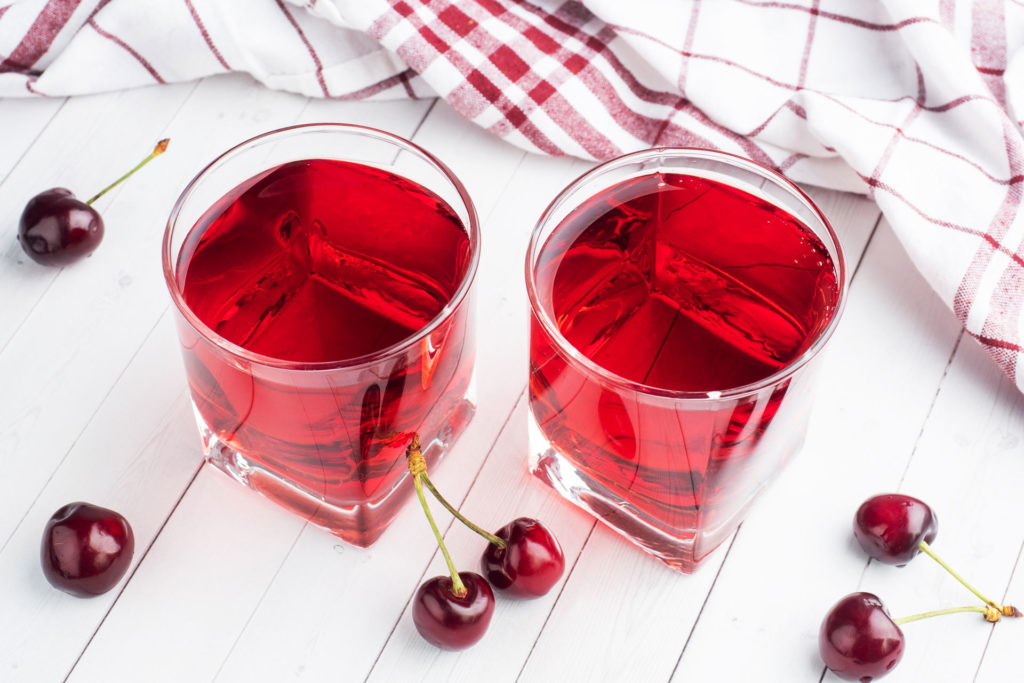 Cherry juice on a white background