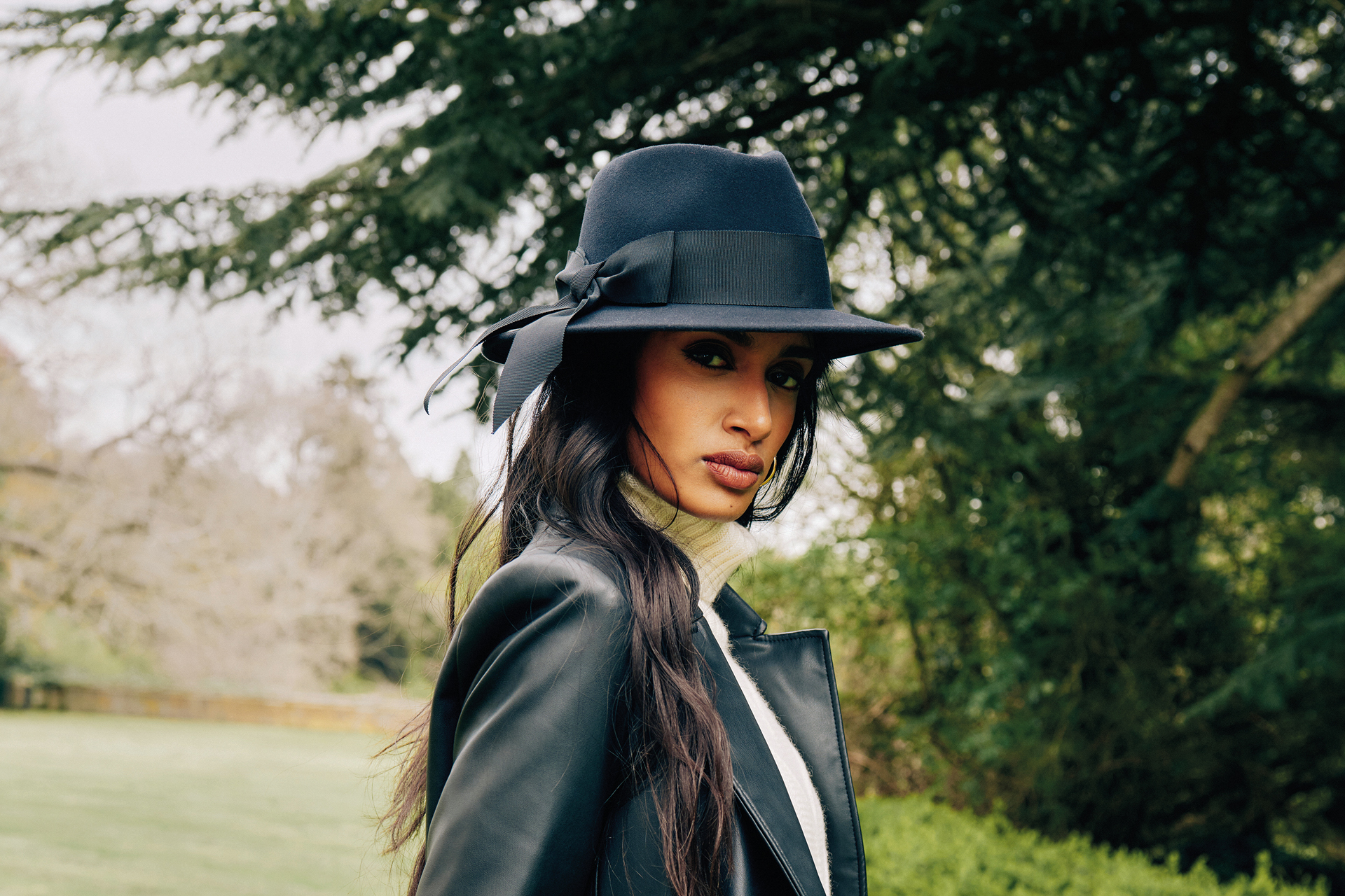 Female model wearing Lock & Co. trilby hat