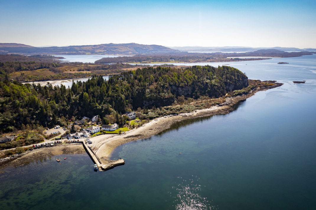 A peninsula sticking into a loch