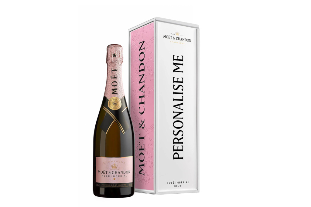 Bottle next to pink box