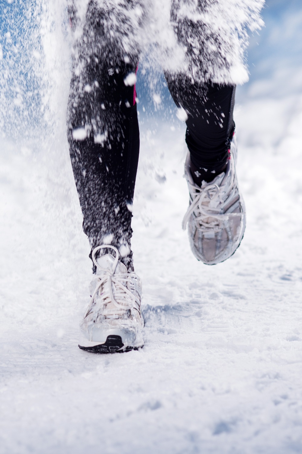 Person running in show | outdoor exercise winter
