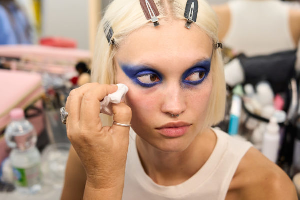Woman getting makeup done