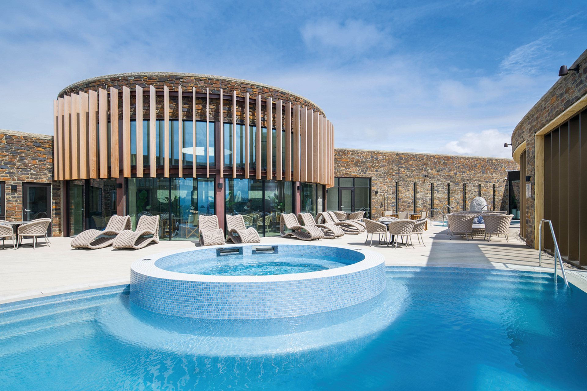 Outdoor pool and loungers