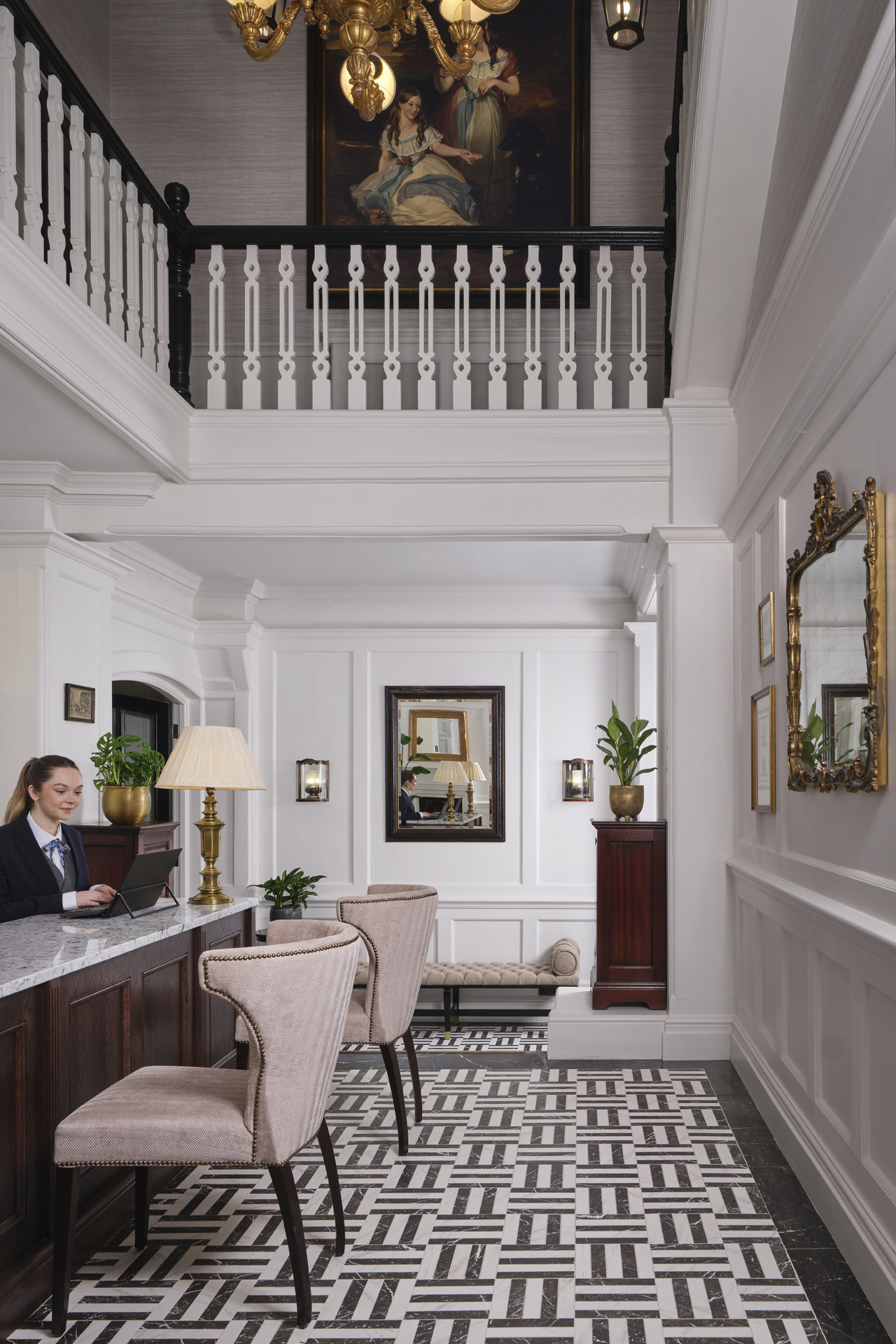 Black and white floor tiles at the homey reception of The Chelsea Townhouse