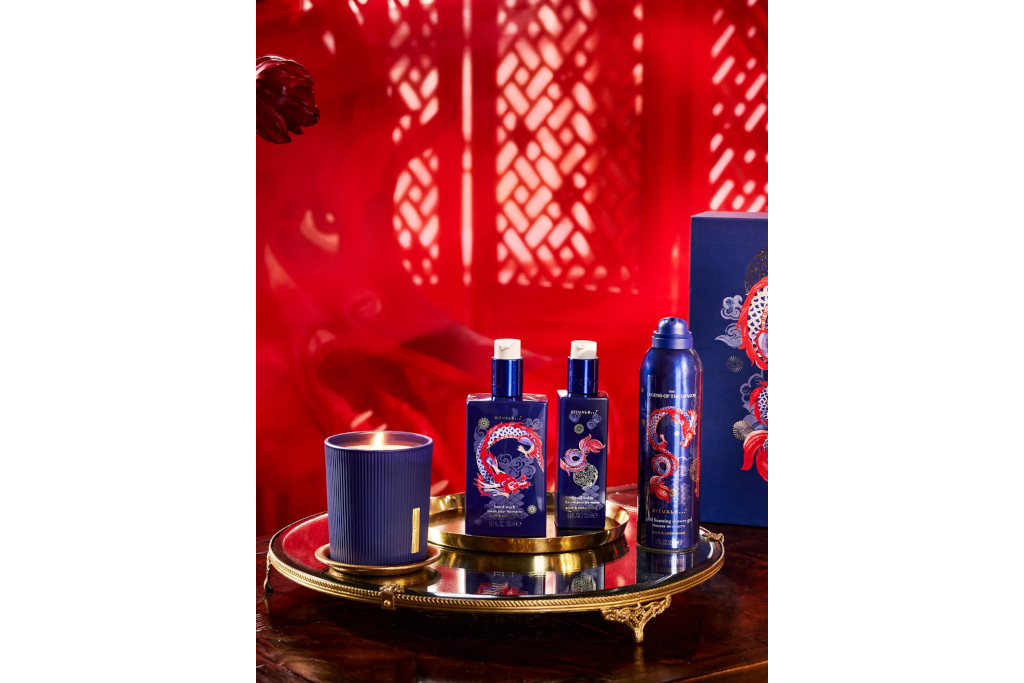 Blue and red skincare gift set on red background
