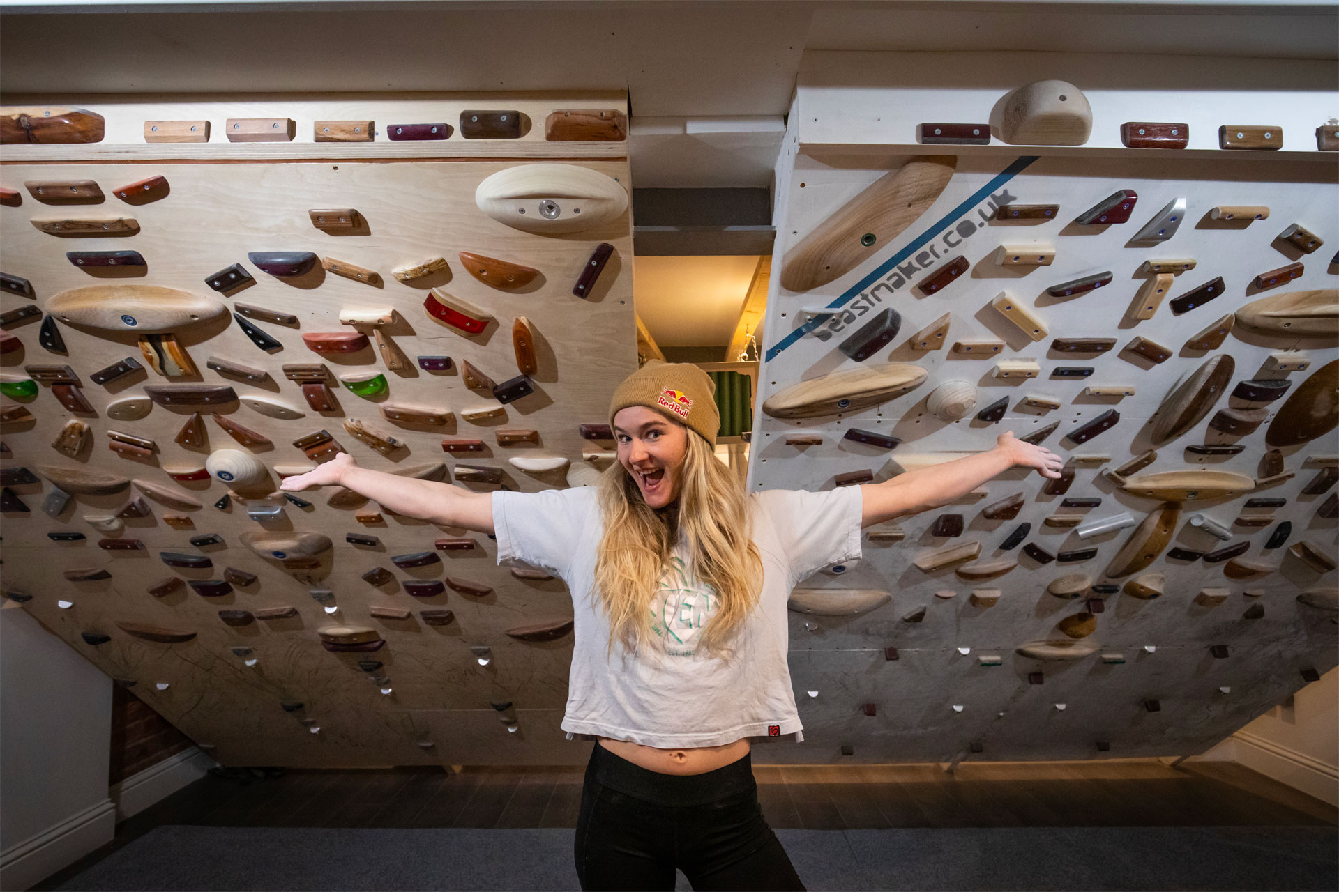 Shauna Coxsey in front of home climbing set up