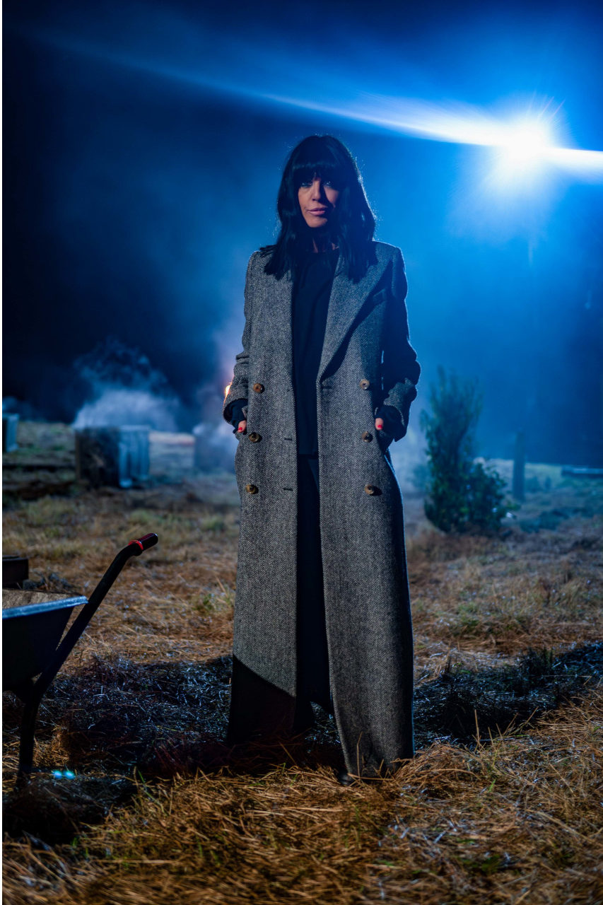 Claudia Winkleman stood in graveyard