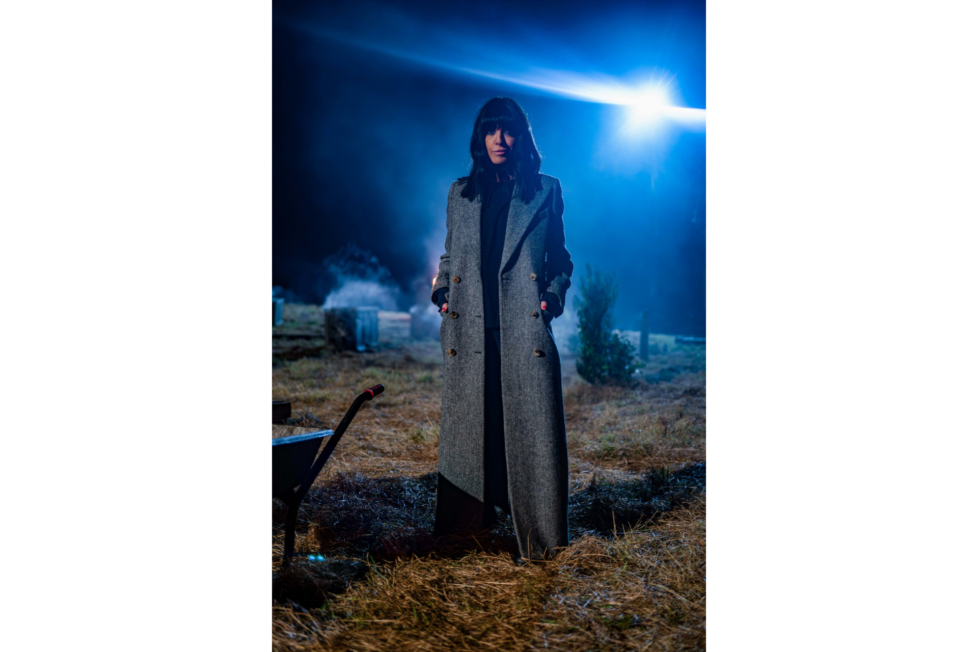 Claudia Winkleman stood in graveyard