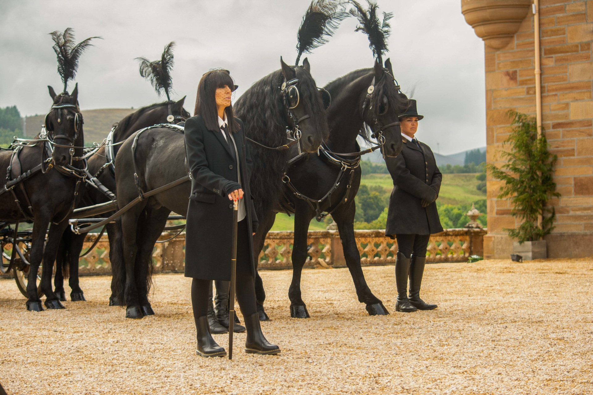 Claudia Winkleman in funeral procession