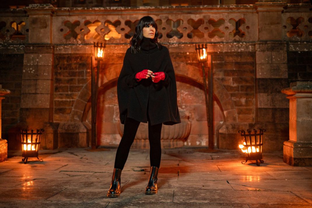 Claudia Winkleman in black cape