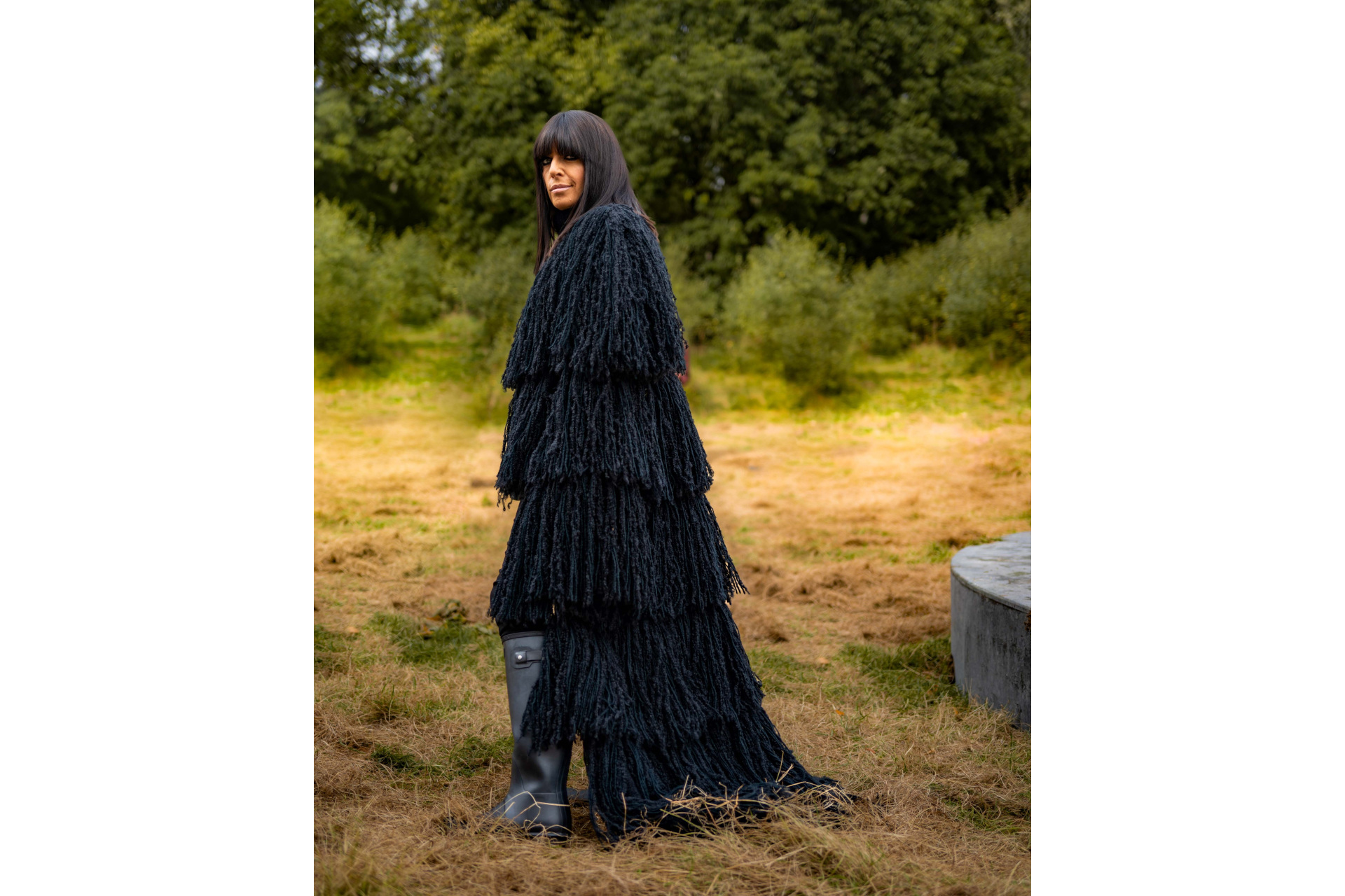 Claudia Winkleman in black coat