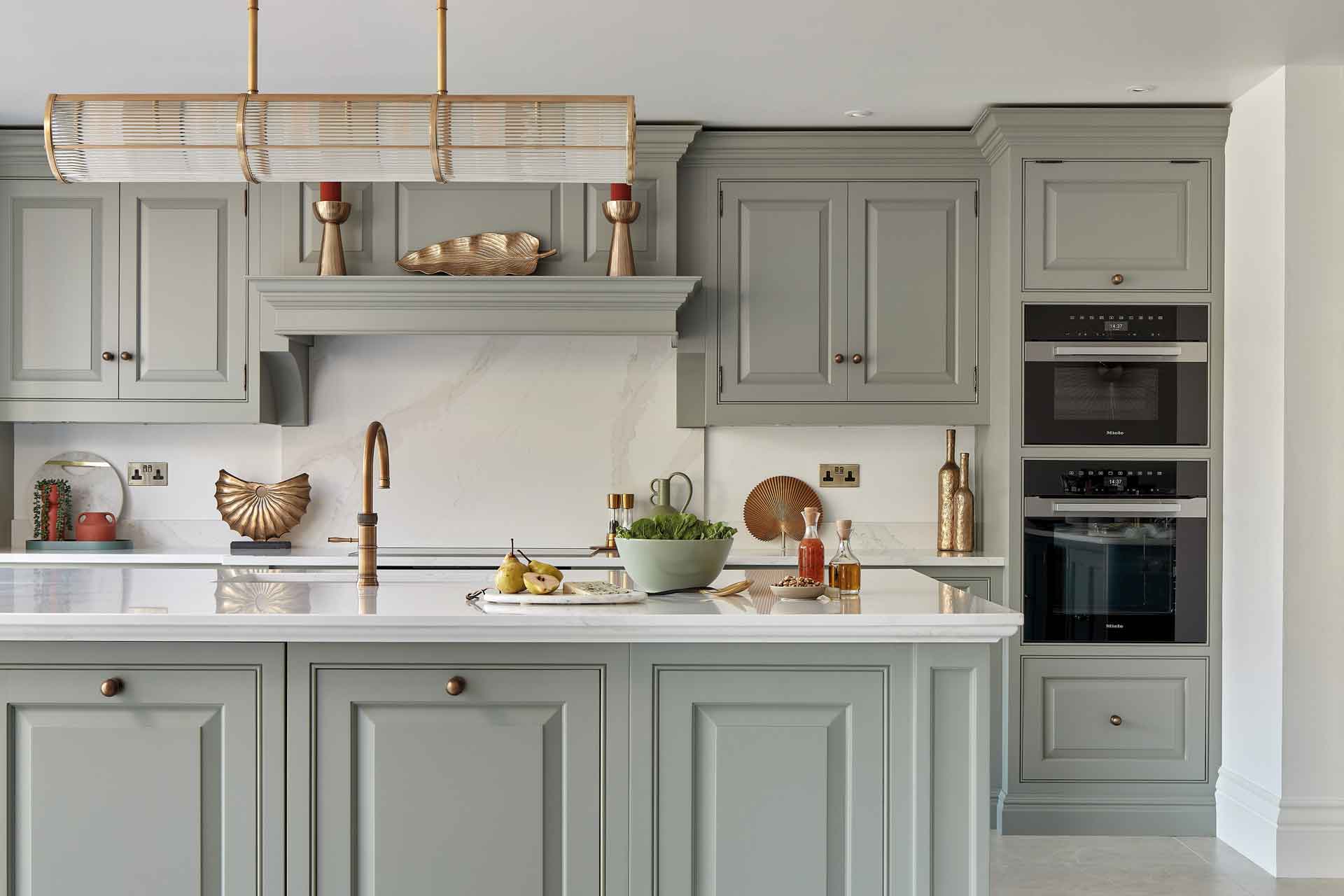 Grey shaker style kitchen with white countertops