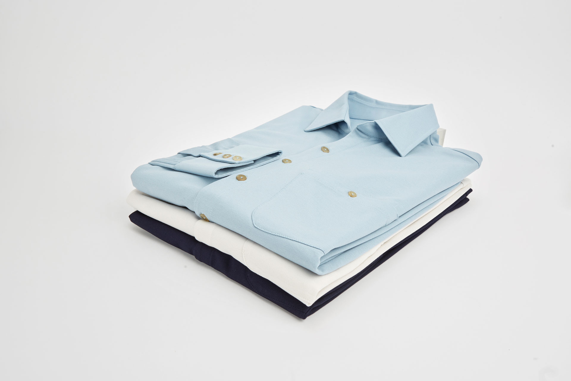 Stack of three crisp shirts