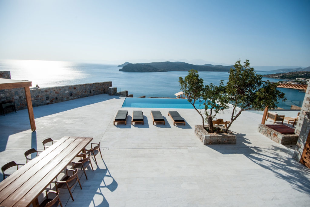 A villa with an infinity pool overlooking the sea