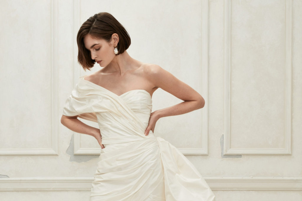 Woman with short hair in wedding dress