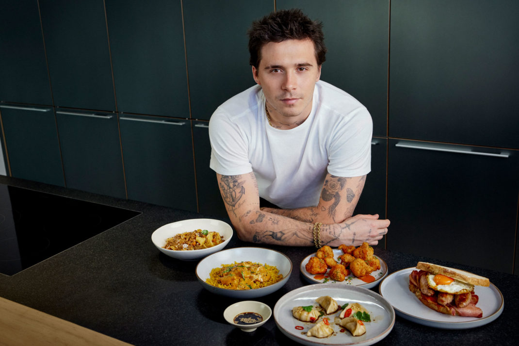 Brooklyn Beckham with a few plates of food