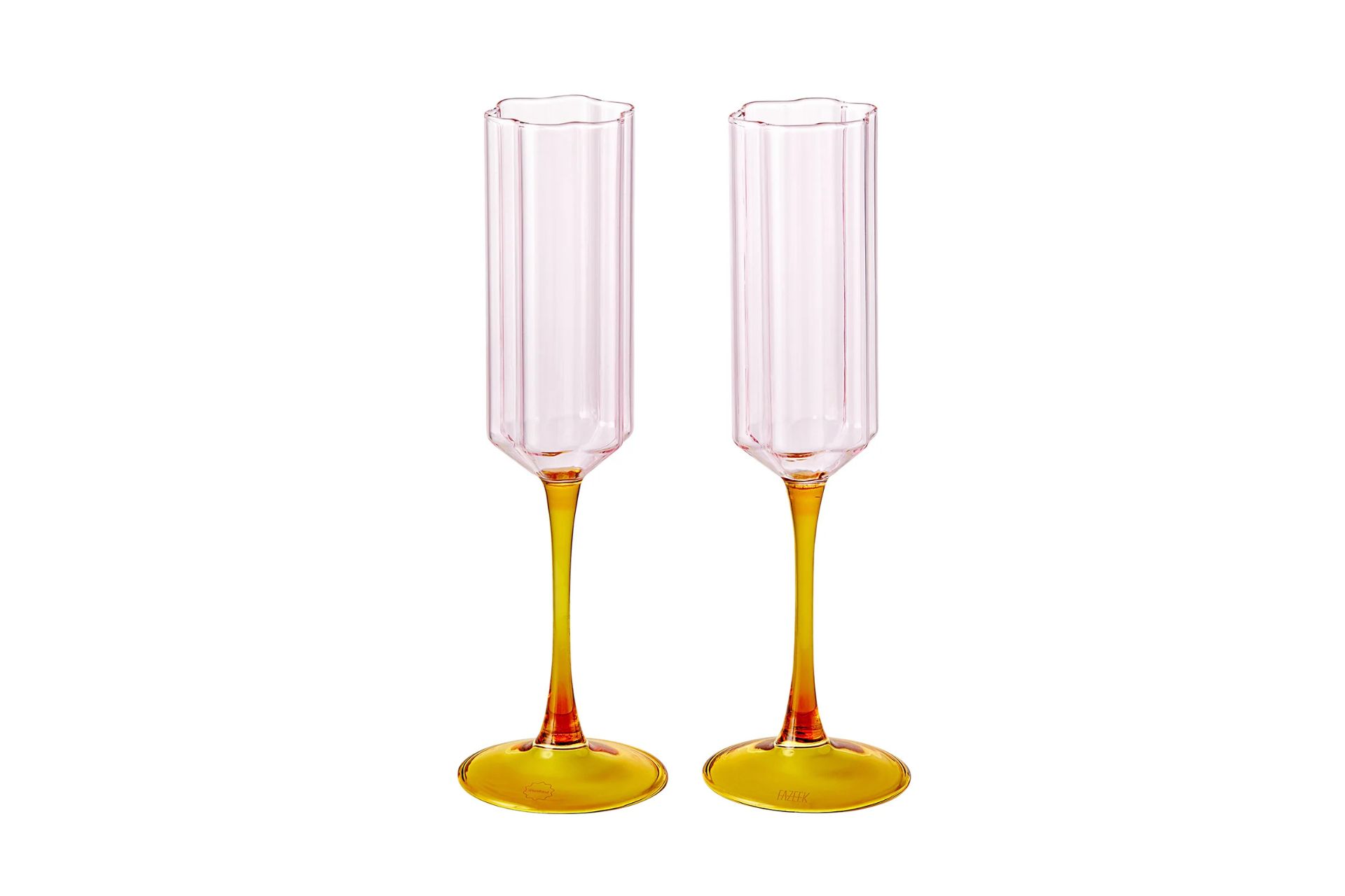 Pale pink glass flutes with mustard yellow stems