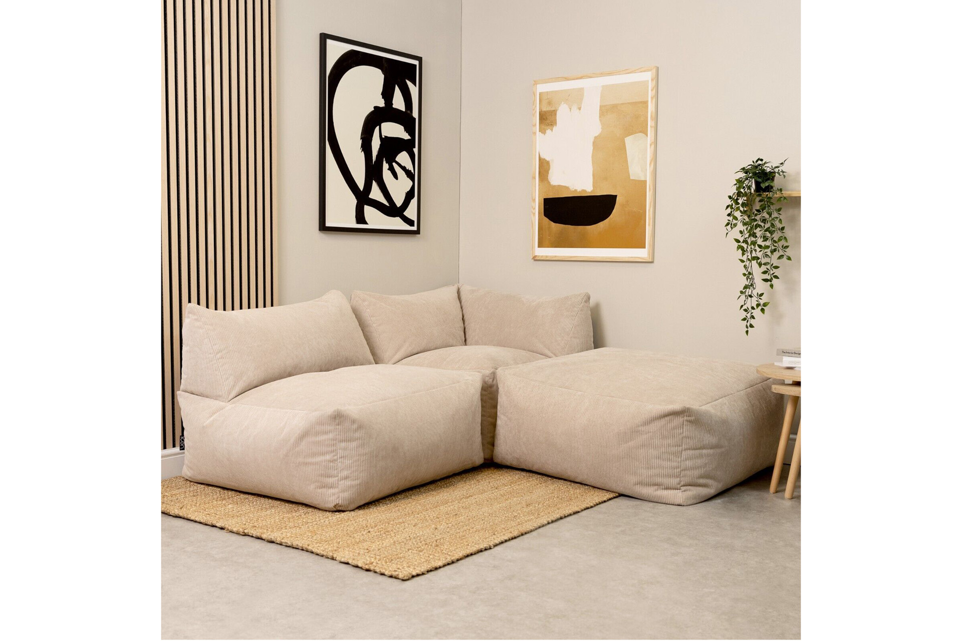 A low modernism-style bean bag sofa in beige cord