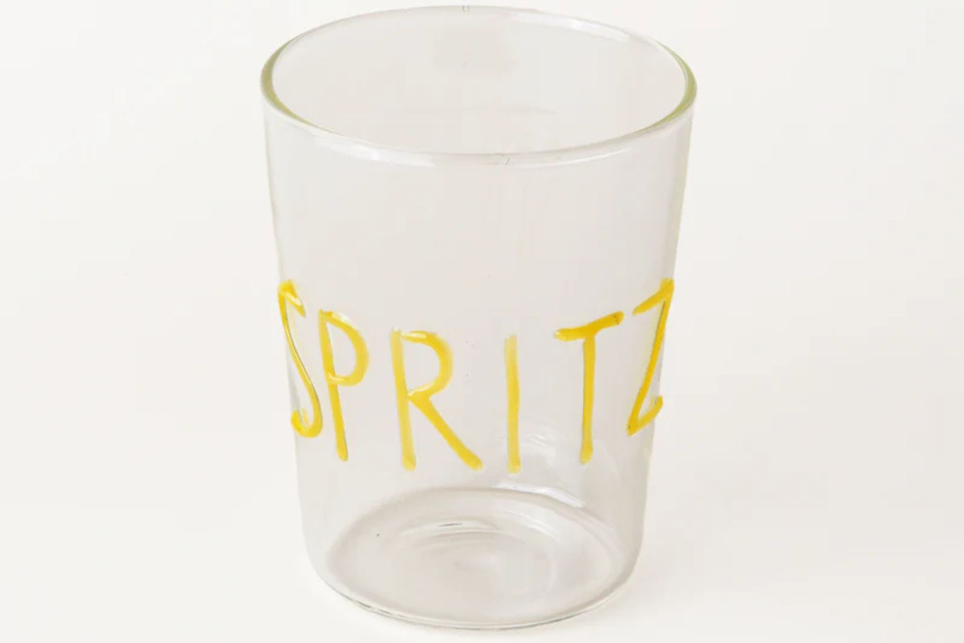 Clear tumbler with yellow 'spritz' text