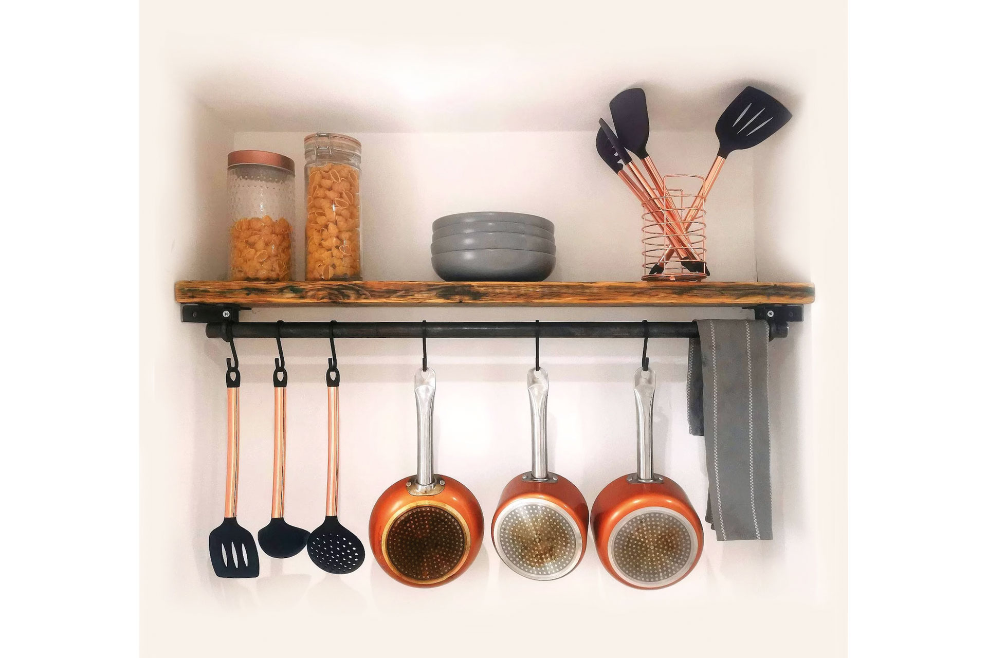 Utensil rail for pans.