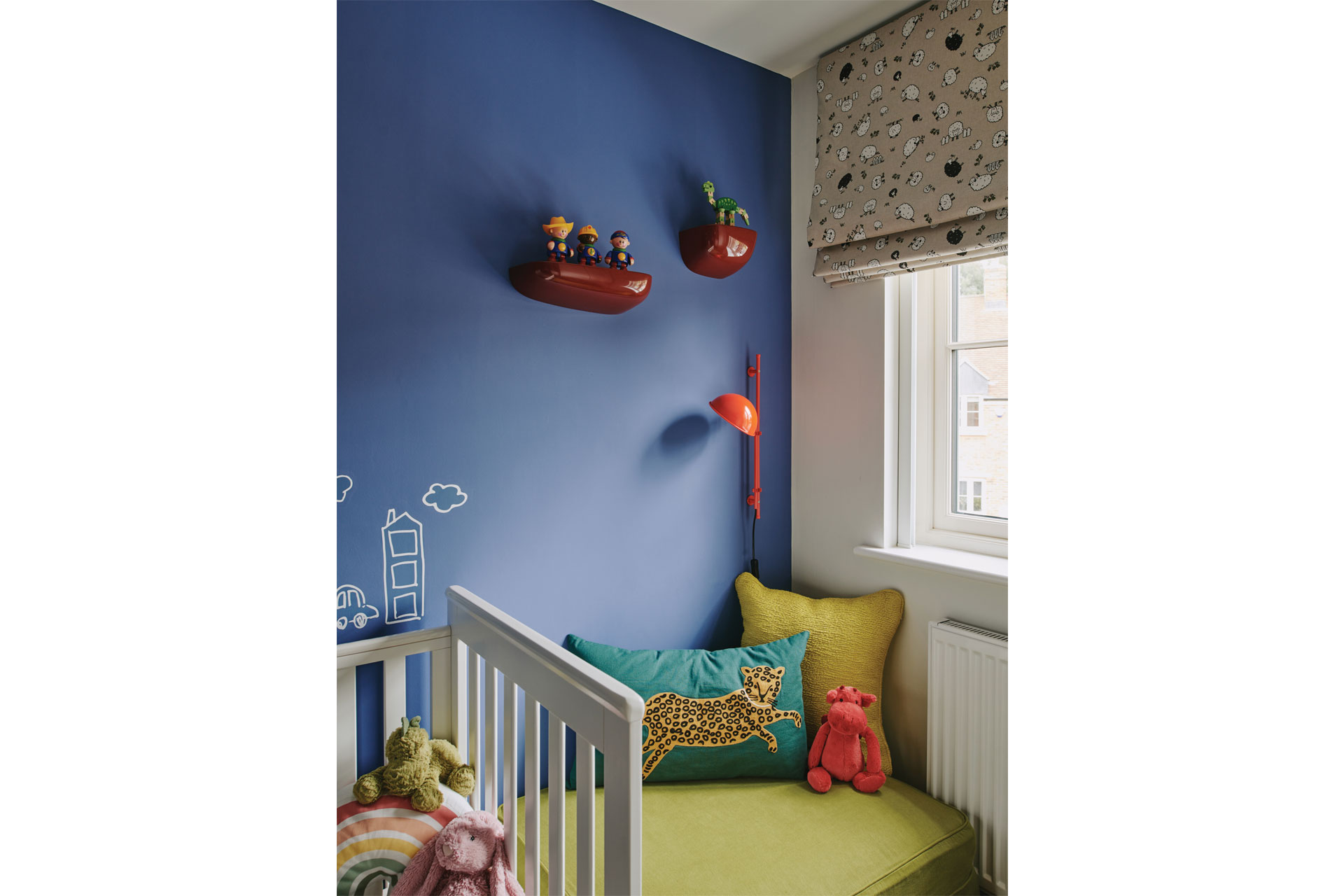Children's room, blue wallpaper and reading nook
