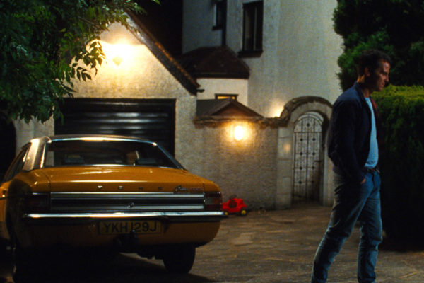 Andrew Scott outside a 1980s suburban home in All Of Us Strangers