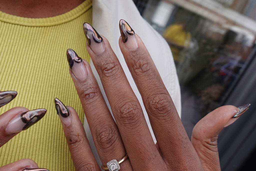 Close up of hands with almond nails