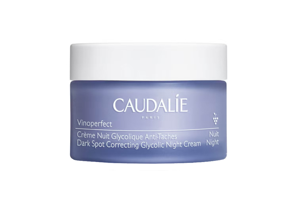 Purple and white tub of night cream