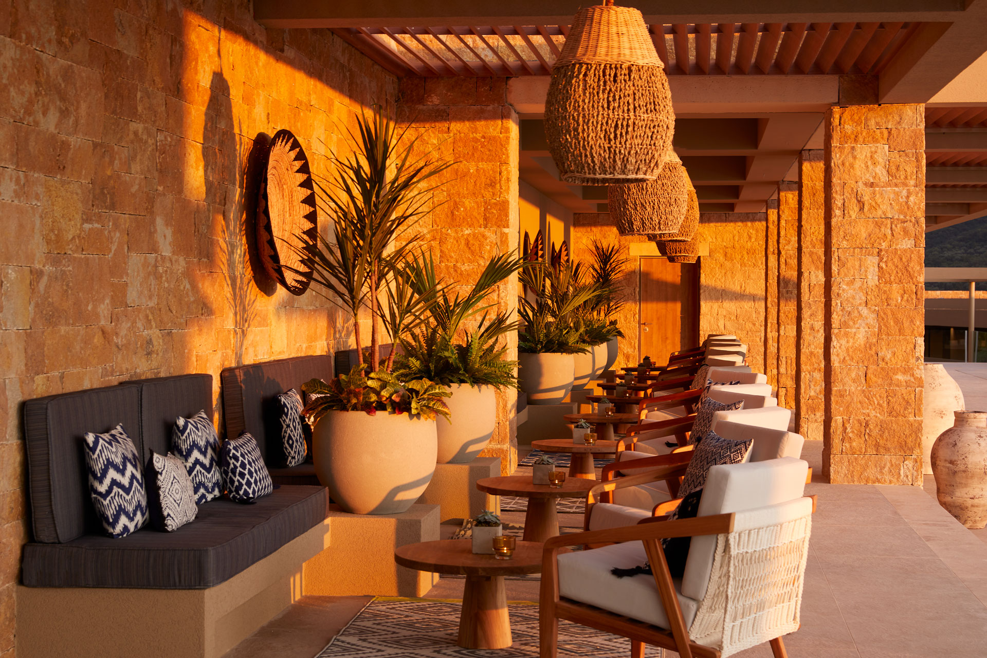 Outdoor restaurant seating at sunset