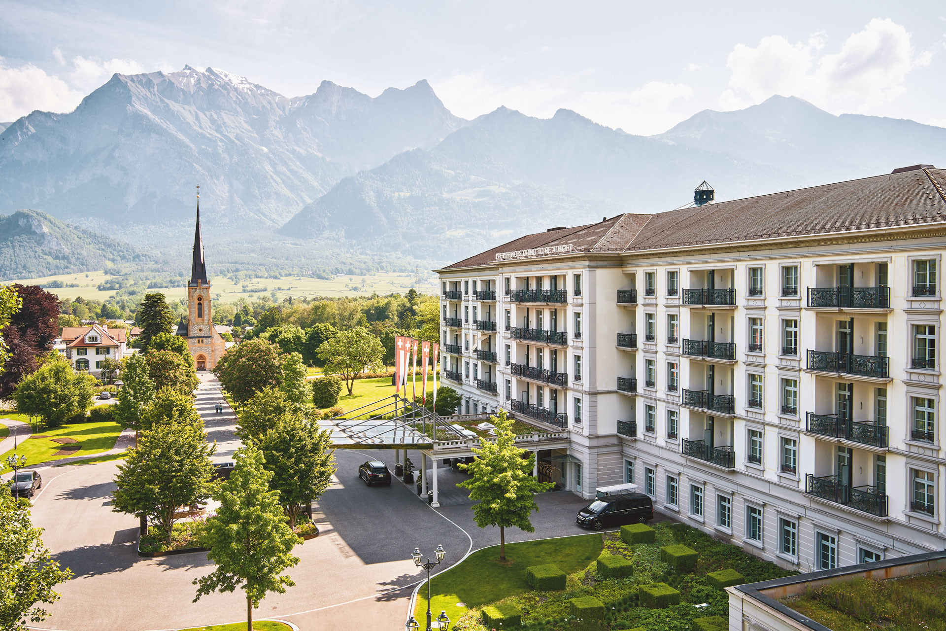 View of Grand Resort Bad Ragaz with a view of the Swiss mountains.