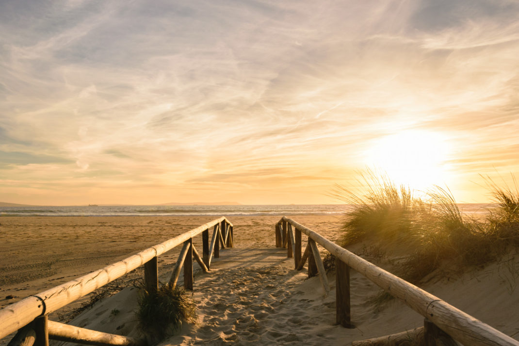 Path on sand at sunset, Tarifa, Spain