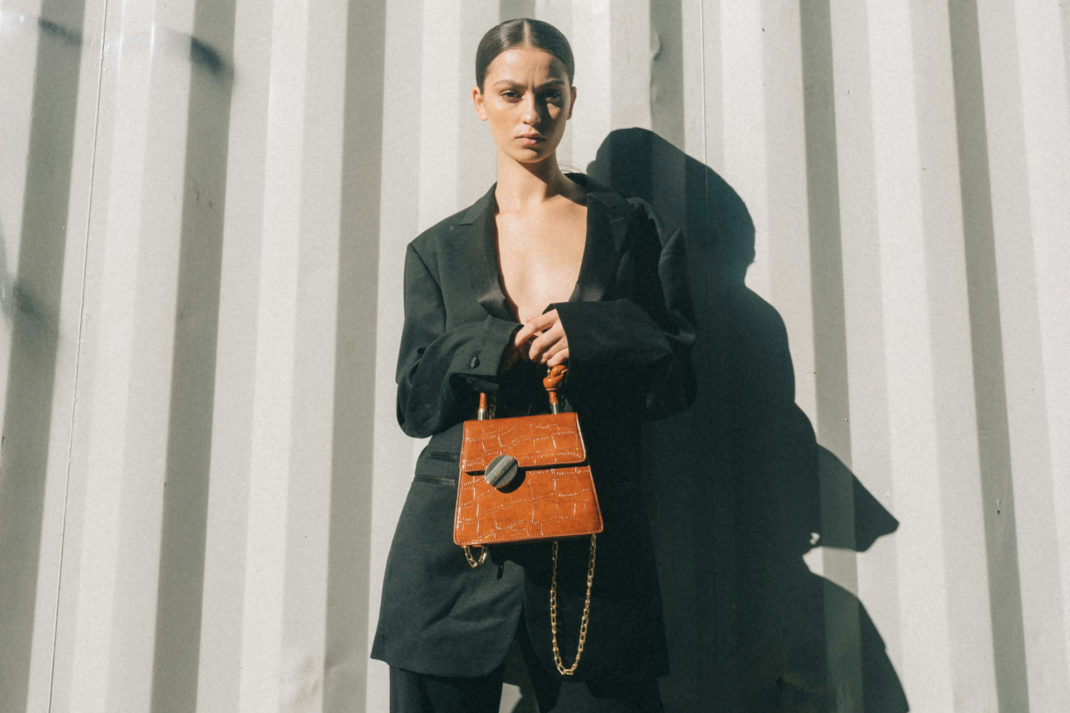 Woman holding bag | 'Jane Birkinifying' Your Bag