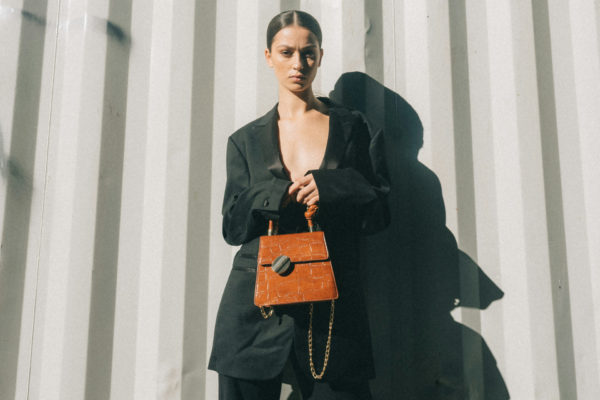 Woman holding bag | 'Jane Birkinifying' Your Bag