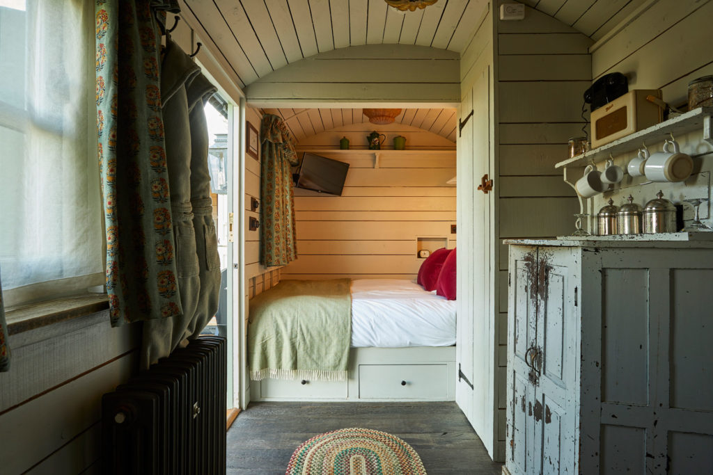 Bedroom in shepherd's hut at THE PIG-on the beach