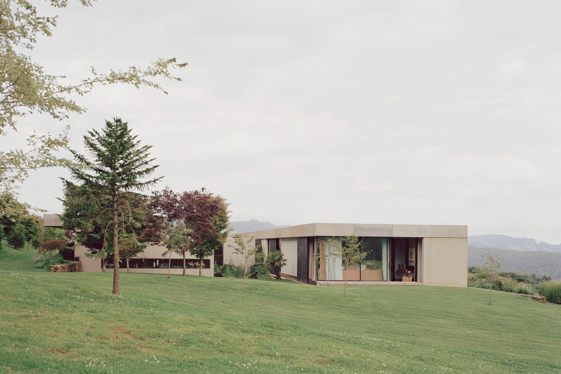 Concrete modernist building on a hillside