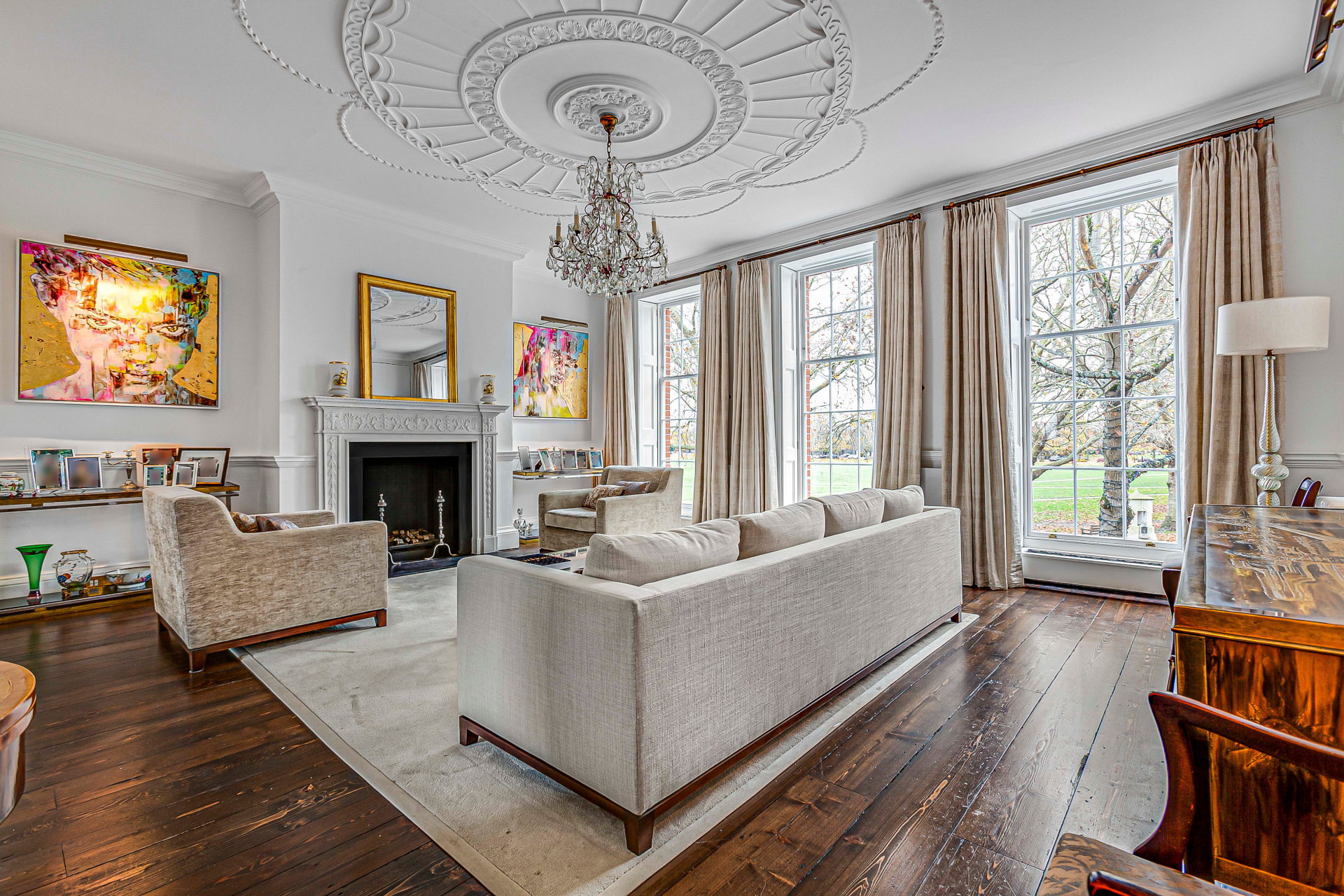 Ornate living room with big windows