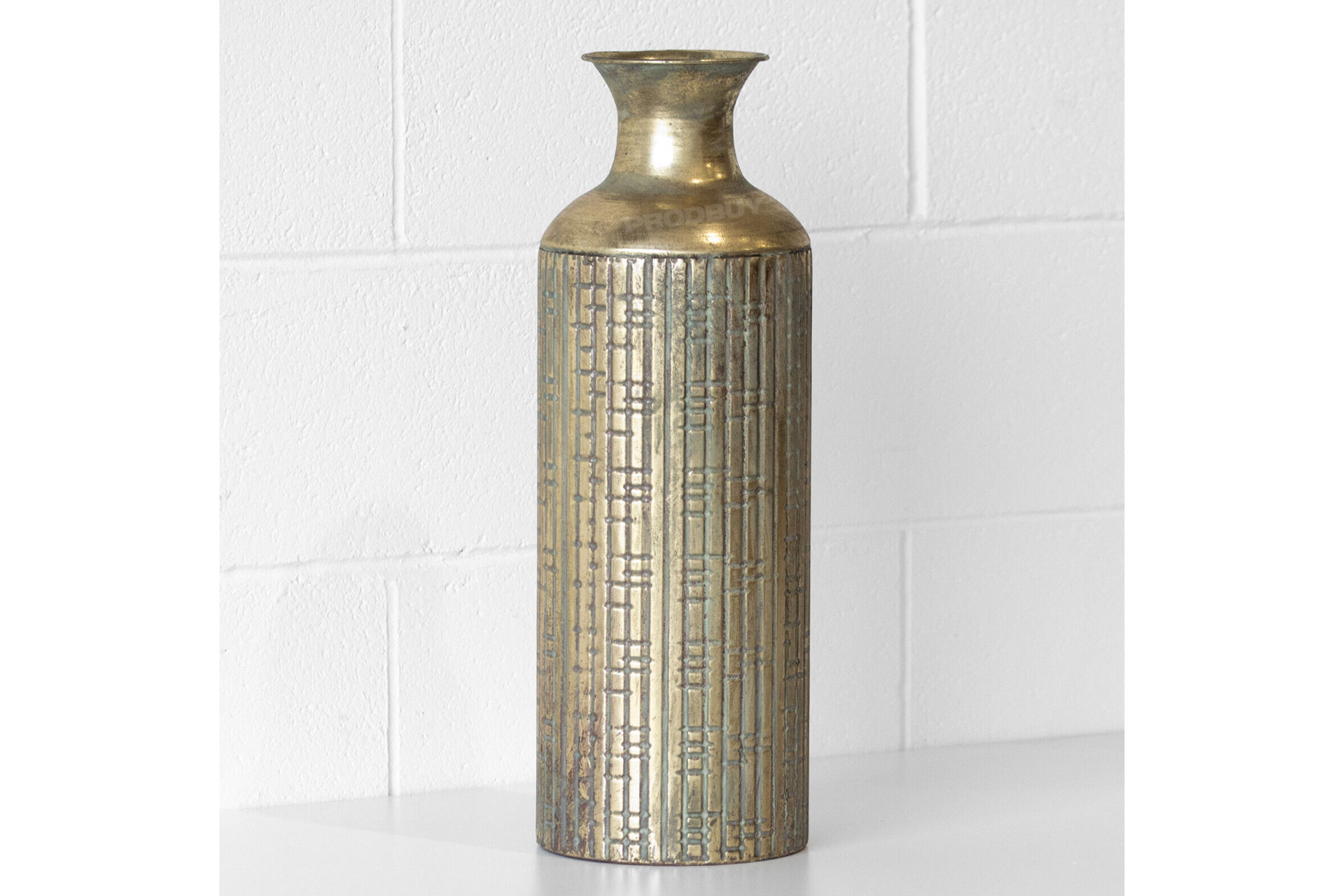 Tall gold vase with thin neck and ribbed design