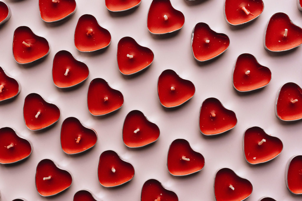 Red heart-shaped tea lights
