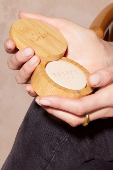 Hands holding soap box