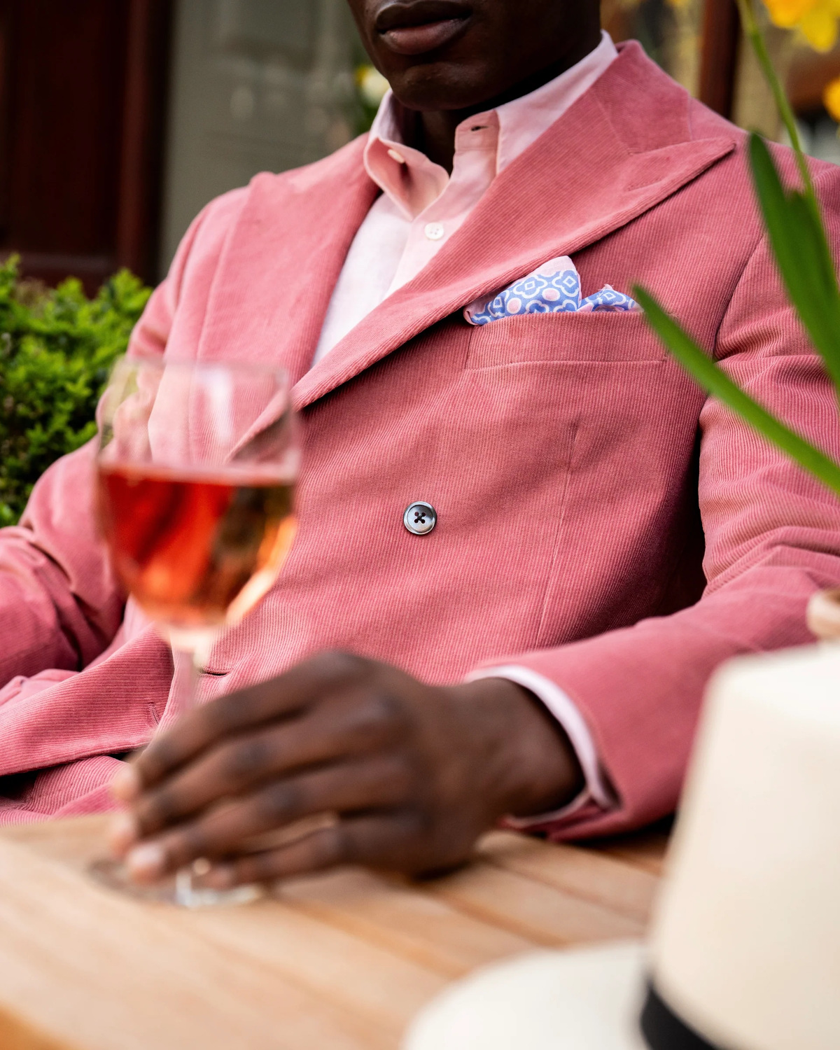Close up of man in pink suit
