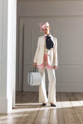 Woman in white suit