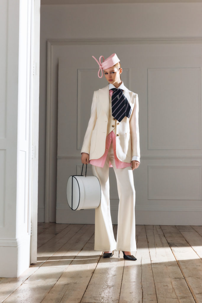 Woman in white suit