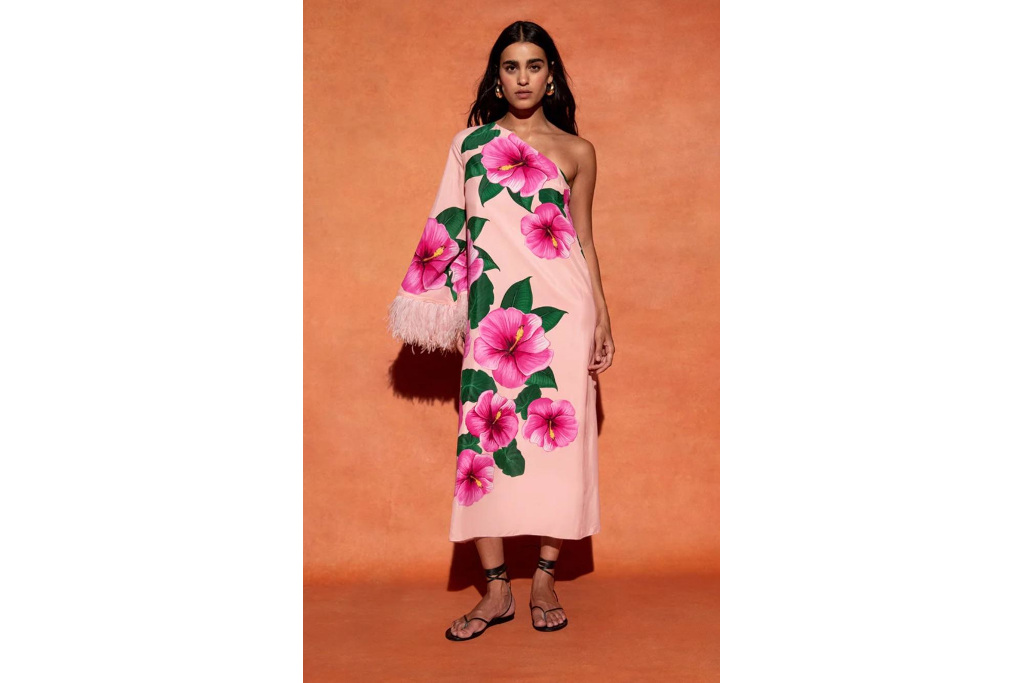 Woman in pink one-sleeve dress