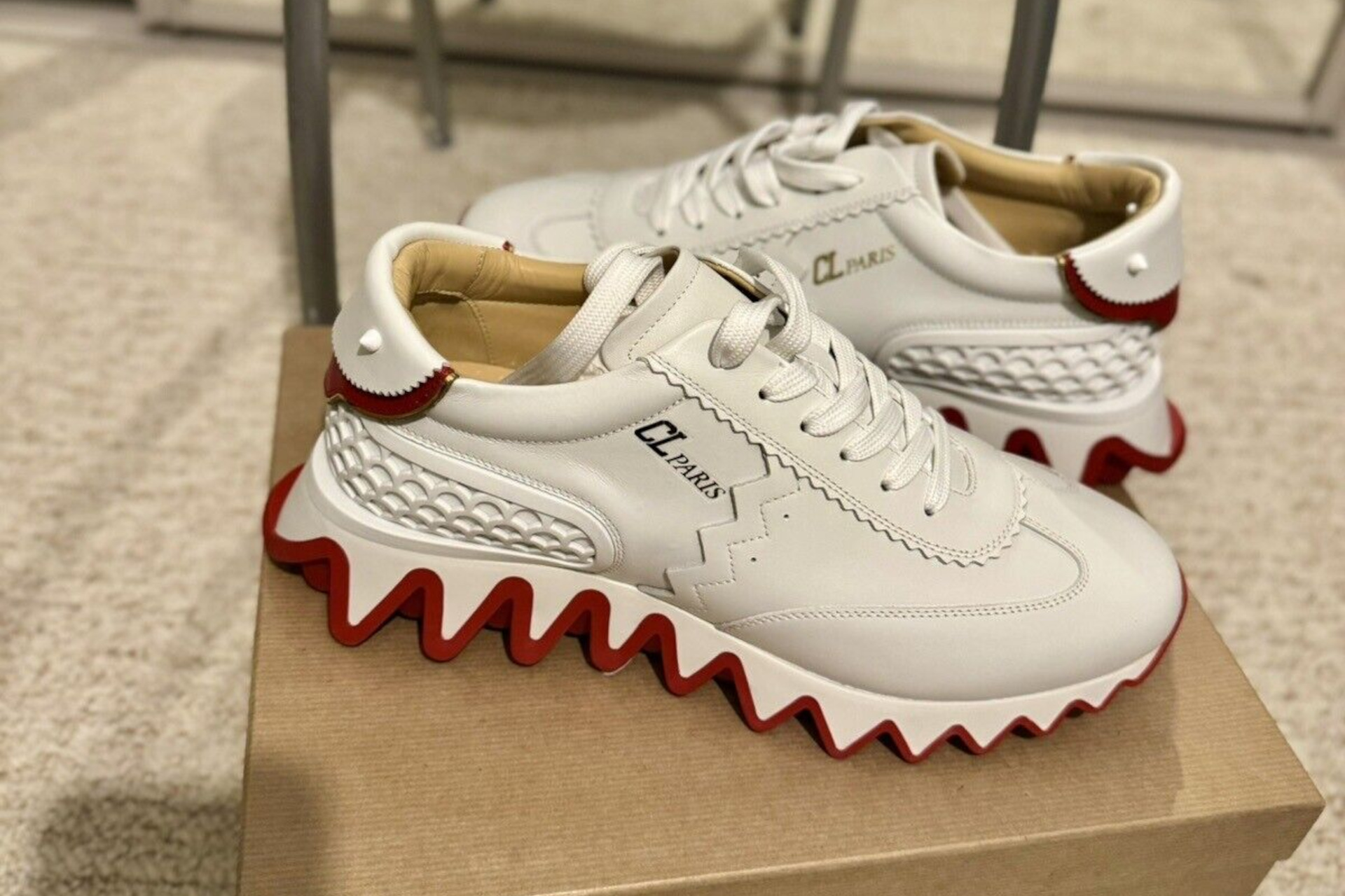 White and red trainers