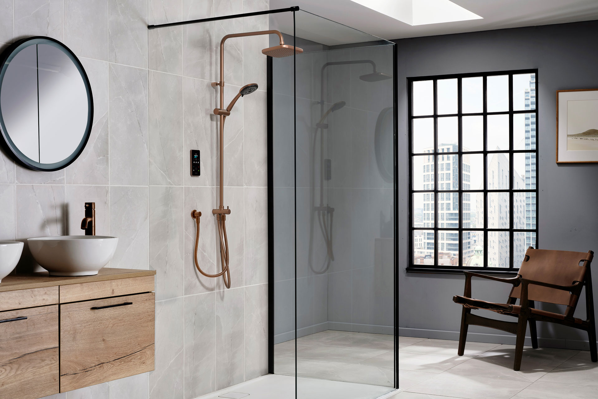 Copper electric shower in a white marble bathroom