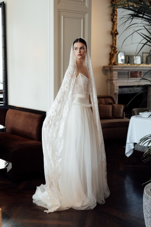 Woman in wedding dress and veil
