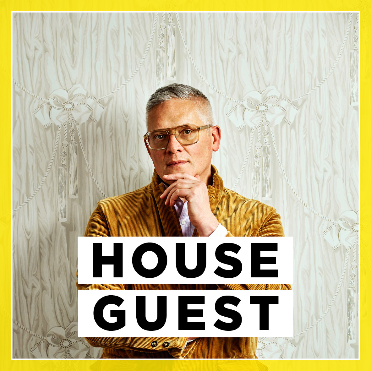 Portrait of Giles Deacon wearing s mustard yellow velvet blazer