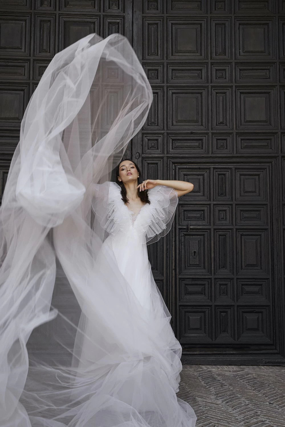 Woman throwing gown in the air