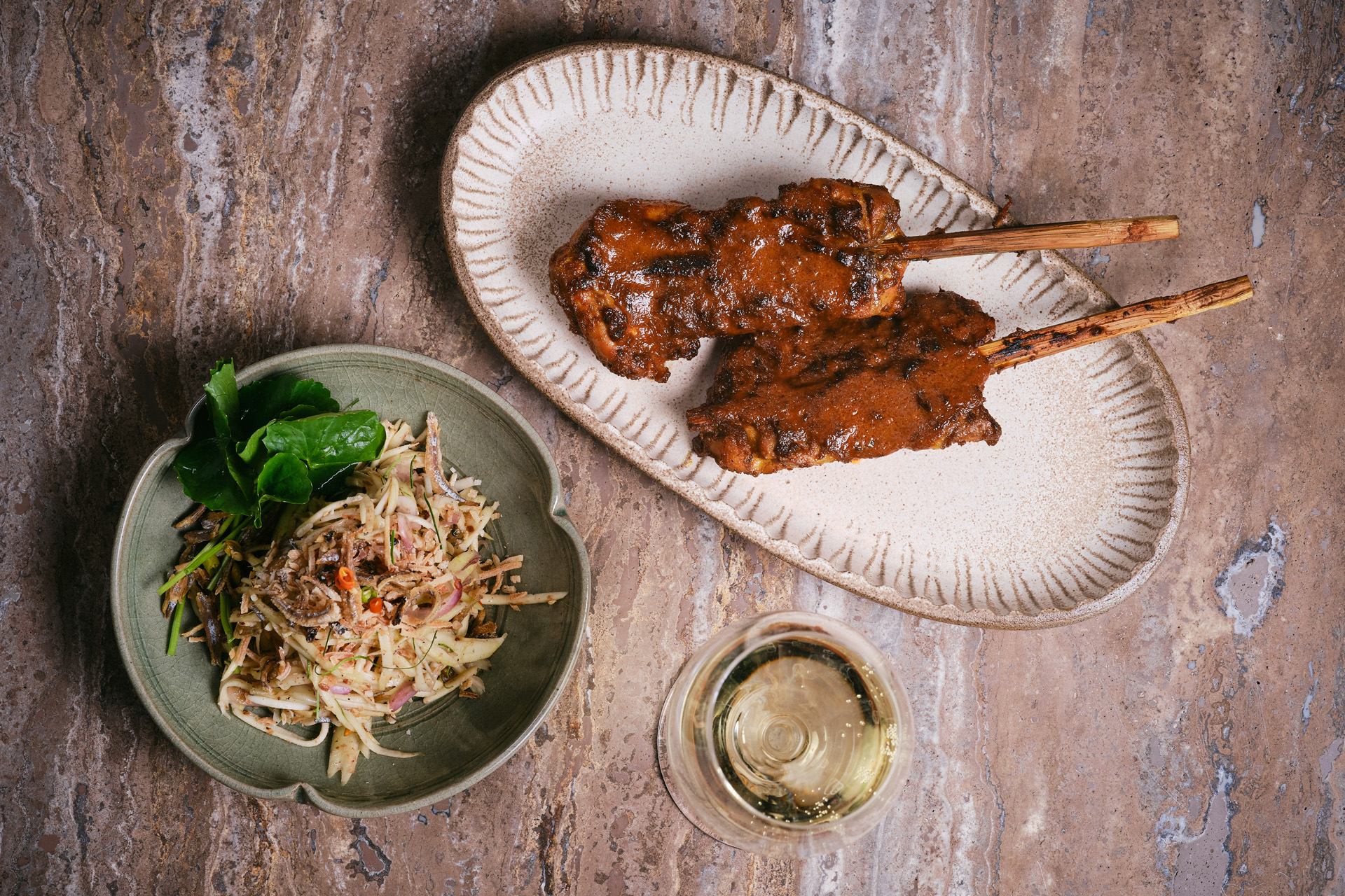 Sour Mango salad & Kolae chicken bamboo skewer